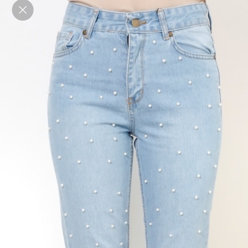 Beautiful beaded jeans with fringe bottoms